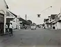 Traffic light over the intersection in the Hoofdstraat of Pasuruan