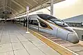 A CR400BF-A EMU on G124 train stops at Qufu East