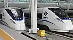 Two CRH1 series E high-speed trains in Shanghai Hongqiao Railway Station