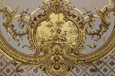 Rococo cartouche with putti in the Cabinet de la Pendule, Palace of Versailles, France, created and sculpted by Jacques Verberckt,1738