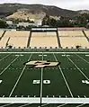 The field at Alex G. Spanos Stadium is shown on the campus of Cal Poly in June 2022, with the university's iconic hillside "P" visible in the background.