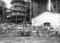 Workers surrounding a furnace soon after its inauguration