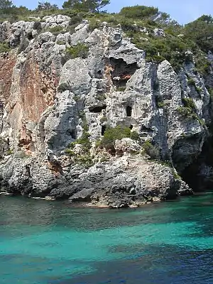 Cales Coves of Menorca. Note the hand-hewn entrances to the caves.