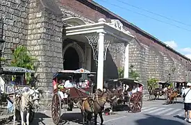 Kalesa parked in front of Vigan Cathedral