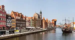 Gdansk waterfront and a old-style ship in the channel