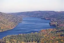 Canadice Lake is one of the Finger Lakes. It is surrounded by the Hemlock-Canadice State Forest.