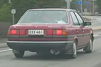 Carina II 1.6DX Sedan rear view, showing placement of license plate