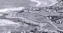 Photograph of Carmel Point including the houses of Fletcher Dutton, Robinson Jeffers, Charles Van Riper, George W. Reamer, and Florence Wells, c. 1925