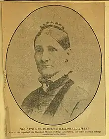 A yellowed newspaper clipping showing a portrait of a white woman in an oval frame