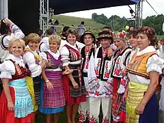 Prešov area Lemkos (left side) and Przemyśl area Ukrainians in traditional attire. Photo: Village Mokre near Sanok. 2007