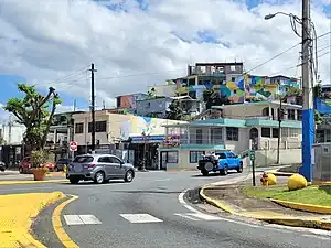 Northern terminus at PR-2 junction in downtown Manatí, looking south