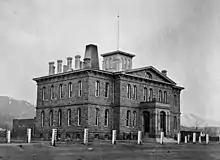 The Carson City Mint building in black and white.