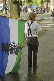 Image 12A man in Portland, Oregon with Cascadian flag on International Workers' Day, 2012 (from Pacific Northwest)