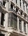 Stained glass windows facing Calle del Clavel