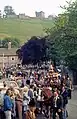 Procession approaching churchyard gates