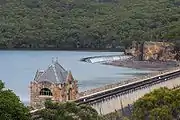 Cataract reservoir at full capacity, discharging through spillway