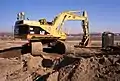 Caterpillar 350L excavator in Louisville, Kentucky, USA, 2001. Note the hydraulic thumb.