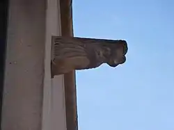 One of the grotesques that adorn the outside of the building, cast in concrete by Wellington sculptor J. A. McCready