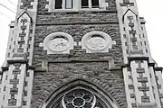 Both roundels on the outside of the tower