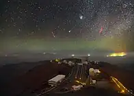 C/2014 Q2 glowing green over La Silla Observatory