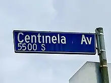 Blue Los Angeles city street sign (5500 south block)