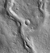 Valleys on the ejecta blanket of Cerulli, as seen by HiRISE.