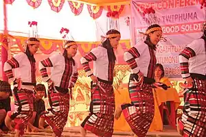 Mizo girls performing the famous 'cheraw' dance.