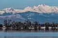 Chiefs Head Peak centered on skyline with Mt. Alice to left and Longs Peak to right. View from Barr Lake in the Denver area.