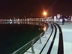 A walkway along Chitgar Lake.