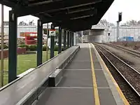 Christchurch platform and baggage conveyor, looking at the line passing beneath the new Blenheim Road overbridge.