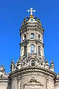 The church and its octagonal tower with the sculptures of the eight Apostles of Jesus Christ