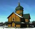 A newly built wooden Church of the Transfiguration.