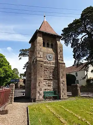 Picture of the Jubilee Clock Tower at Churchill in North Somerset, taken from the west of the tower, looking towards Dinghurst Road