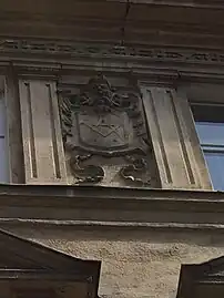 Detail of the cartouche displaying a triangle and a compass