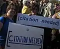 Chance meet of two [citation needed] signs at the rally