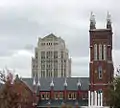 Atlanta City Hall seen behind The Catholic Shrine of the Immaculate Conception, which was built in 1873