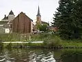 Looking across the canal towards the church