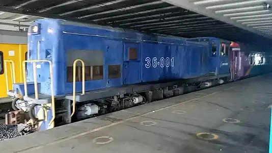 No. 36-001 in Spoornet blue livery with outline numbers at Cape Town Station carrying Shosholoza Meyl Carriages, 09 December 2023