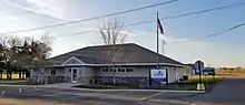 one-story building with sign reading City of Clear Lake city offices