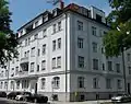 Early 20th century built corner building with bay windows and plaster decoration in forms of late Art Nouveau at Clemensstraße 38