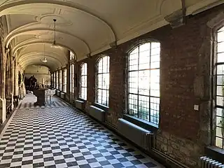 Inside view of the cloister including the baptismal font