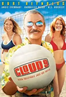 A man holding out a volleyball, with a blonde women and a redhead standing behind him, in front of a volleyball net.