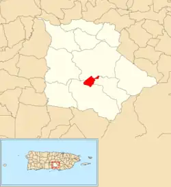 Location of Coamo barrio-pueblo within the municipality of Coamo shown in red