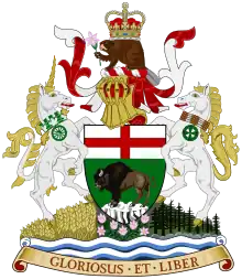 A central shield showing a bison standing on a rock, under a St George's Cross. On top of the shield sits a helmet decorated with a red and white billowing veil. On top of the helmet sits a beaver with a crown on its back, holding a prairie crocus. To the right of the shield is a rearing white unicorn wearing a collar of white and green maple leaves, from which hangs a green cart-wheel pendant. To the left of the shield is a rearing white horse wearing a collar of Indian beadwork, from which hangs a green cycle of life medallion. The animals and shield stand on a mound, with a wheat field beneath the unicorn, prairie crocuses beneath the shield, and spruces beneath the horse. Beneath the mound are white and blue waves, under which is an orange scroll bearing the words "GLORIOSUS ET LIBER"