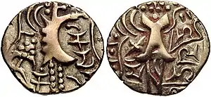 Possible coinage of Yashovarman.Obverse: abstract Kushan-style king standing, Kidara monogram to inner right. Reverse: Abstract Ardoxsho seated facing, Brahmi script legend “Sri Yasova” to right, “rma” to left. of Varman dynasty of Kannauj