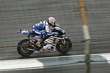 Colin Edwards, riding a "USA" liveried Yamaha Tech 3 at the 2008 Indianapolis Grand Prix.