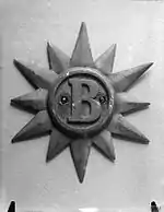 Ship's badge of HMS Brilliant (IWM Q20182)