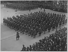 B&W image of men marching