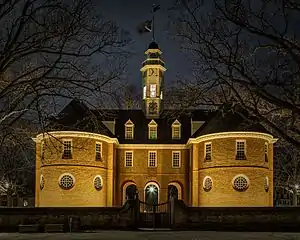 The reconstructed building at night.