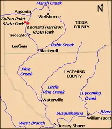 Map of Pine Creek flowing from north to south. Marsh Creek enters it in the north at Ansonia, the two parks are south of this, below is the village of Tiadaghton, and further south Babb Creek enters at Blackwell. Also in Tioga County are Wellsboro (east of the parks) and Leetonia (southwest of Tiadaghton). Lycoming County is further south and there Pine Creek receives Little Pine Creek at Waterville, and enters the West Branch Susquehanna River south of Jersey Shore. To the east is Lycoming Creek, which enters the river at Williamsport.